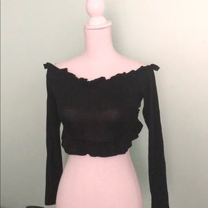 Black ruffle off the shoulder crop top.